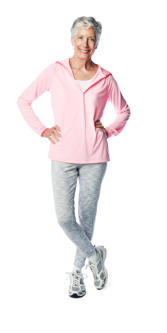 A doctor examines the knee of an elderly surgical patient who is lying on a hospital bed